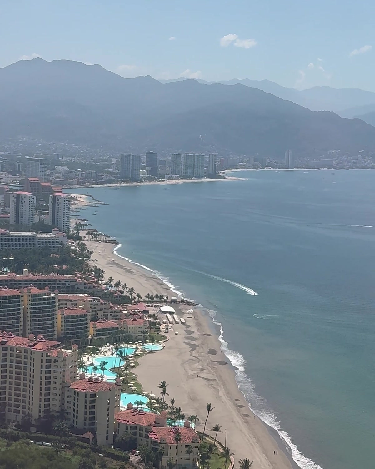 Marina Vallarta's beach and the Hotel Zone seen from a plane just after takeoff
