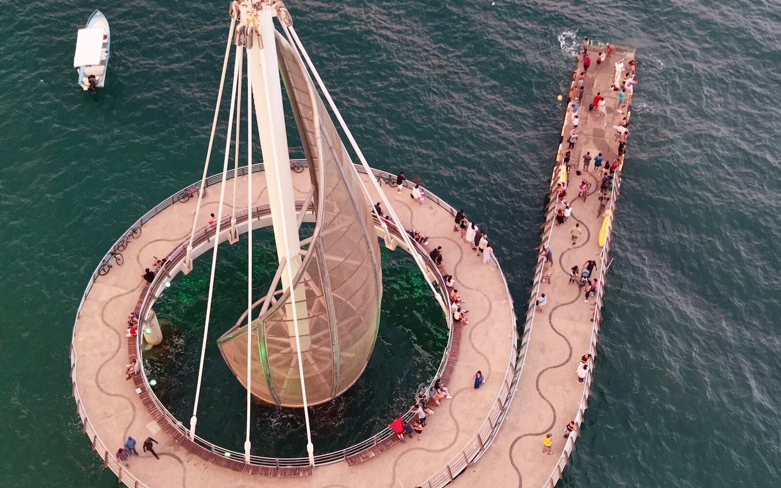 Los Muertos Pier from the air at golden hour