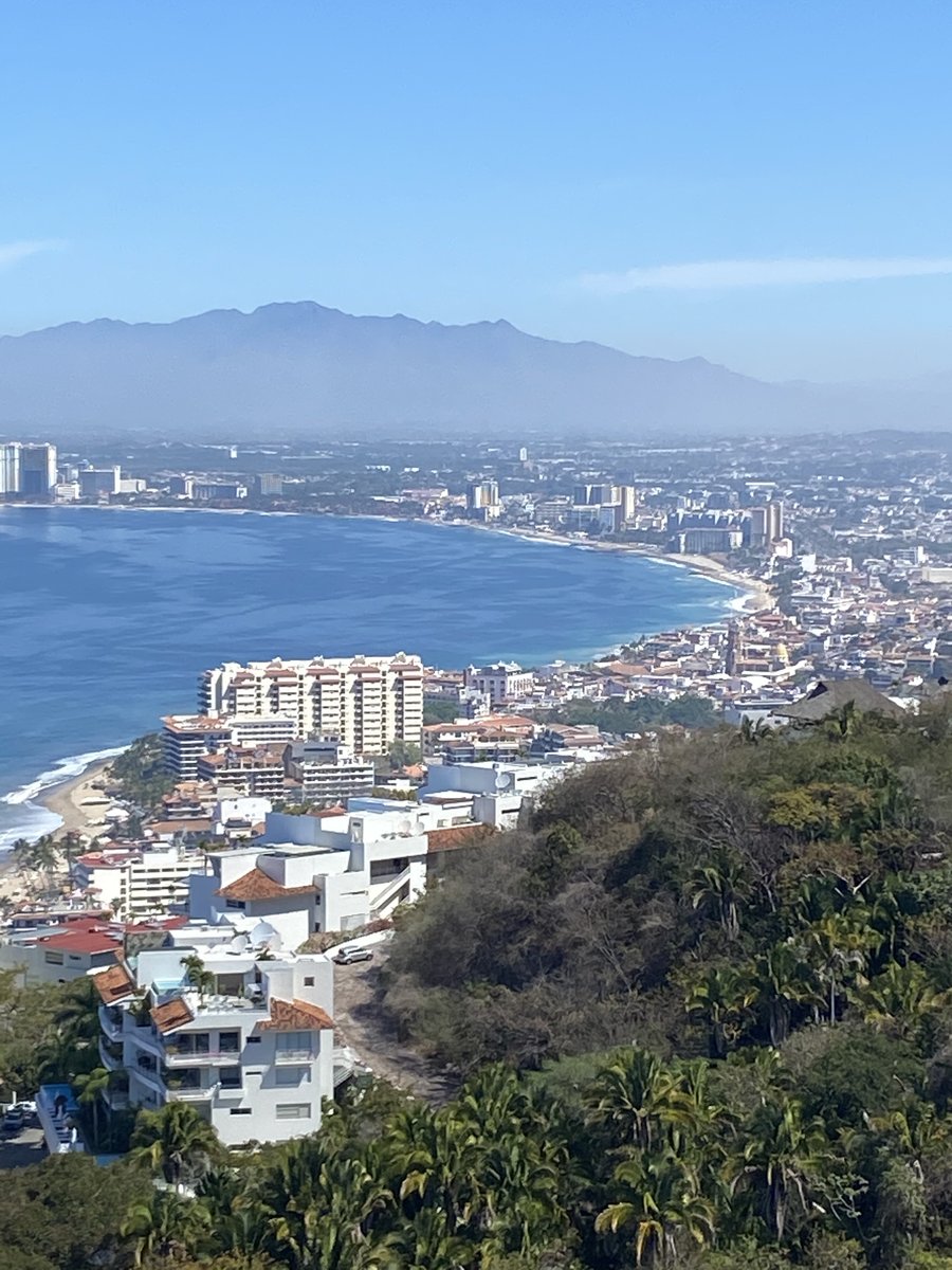 Looking down from the Amapas hillside over the towers to Banderas Bay and the mountains