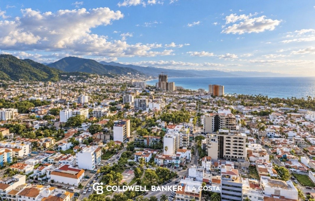 Versalles from the air, with the hotel zone and Banderas Bay beyond