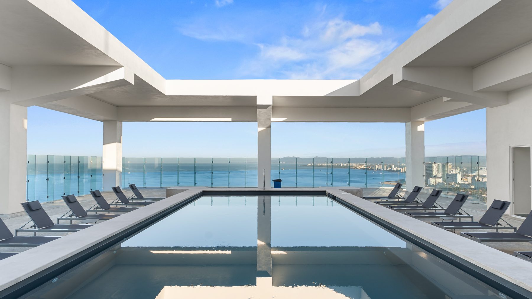 The covered rooftop pool at Harbor 171 overlooking the bay