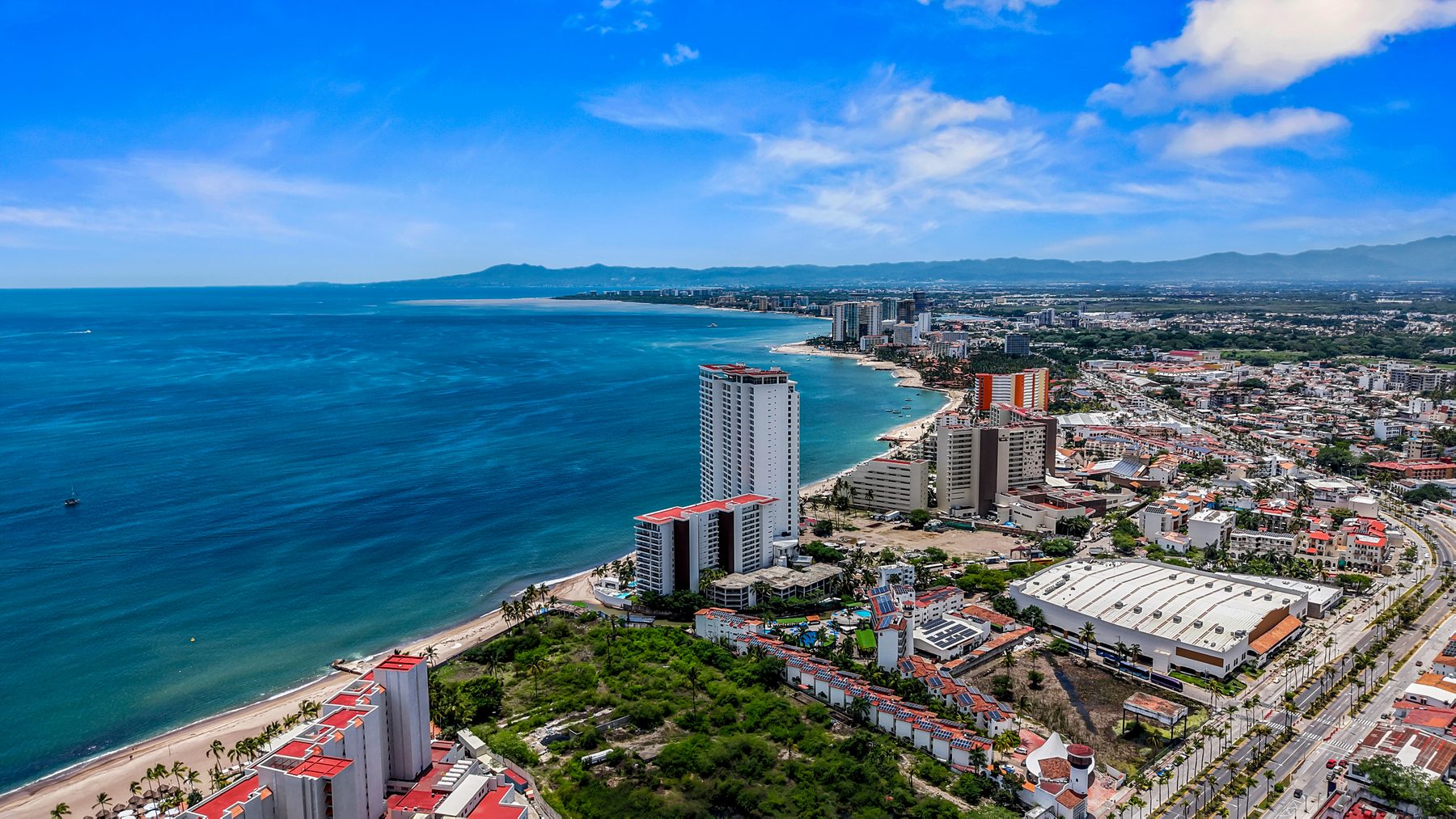 Aerial view looking north along the Hotel Zone shoreline and its towers
