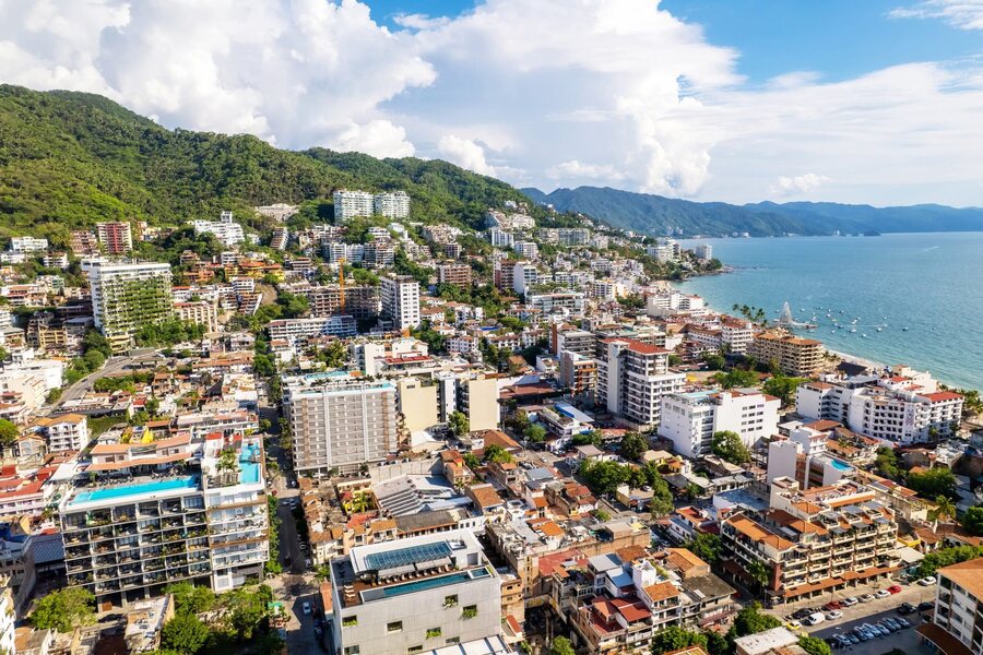 Puerto Vallarta from the air, the town running down to Los Muertos beach