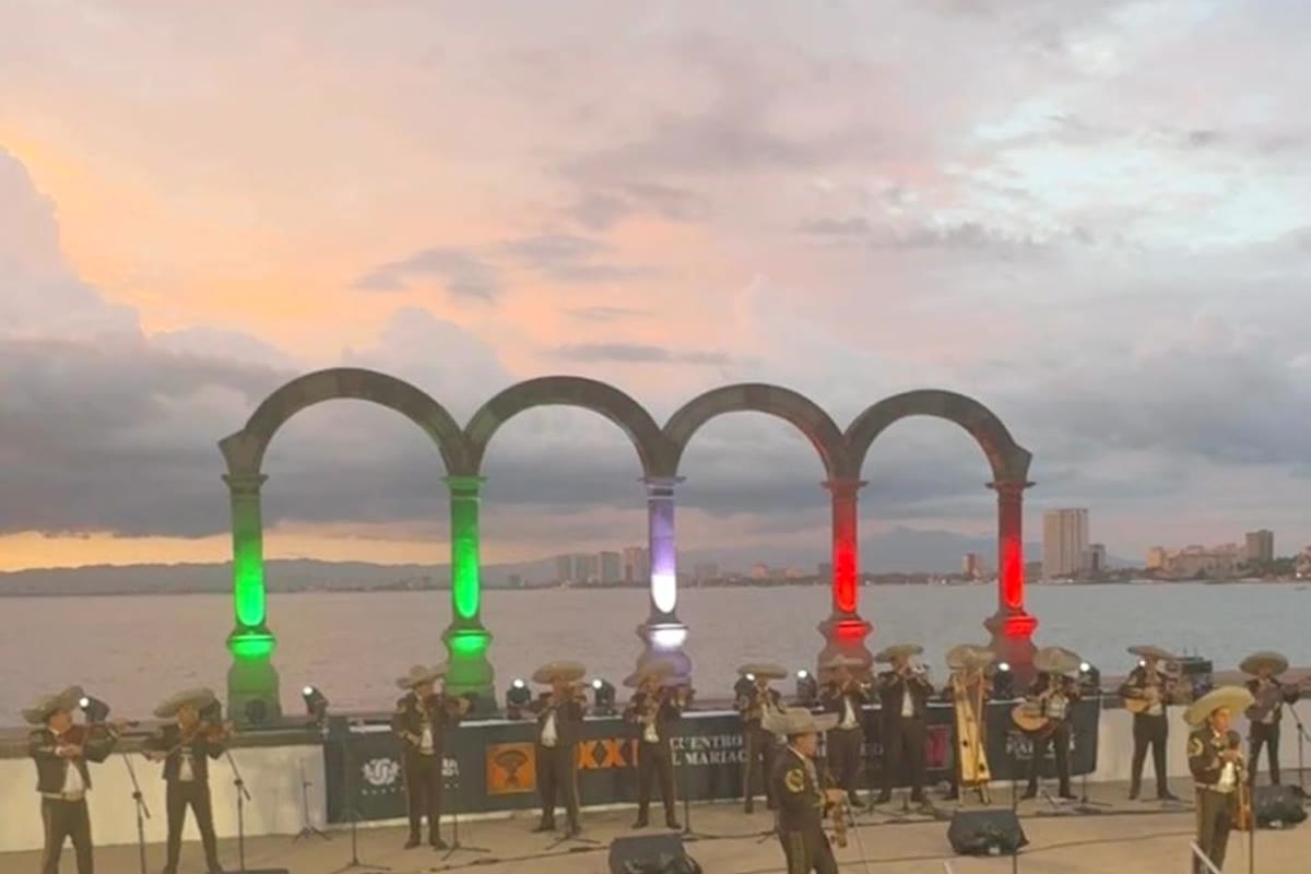 The Malecón arches in Puerto Vallarta lit at dusk